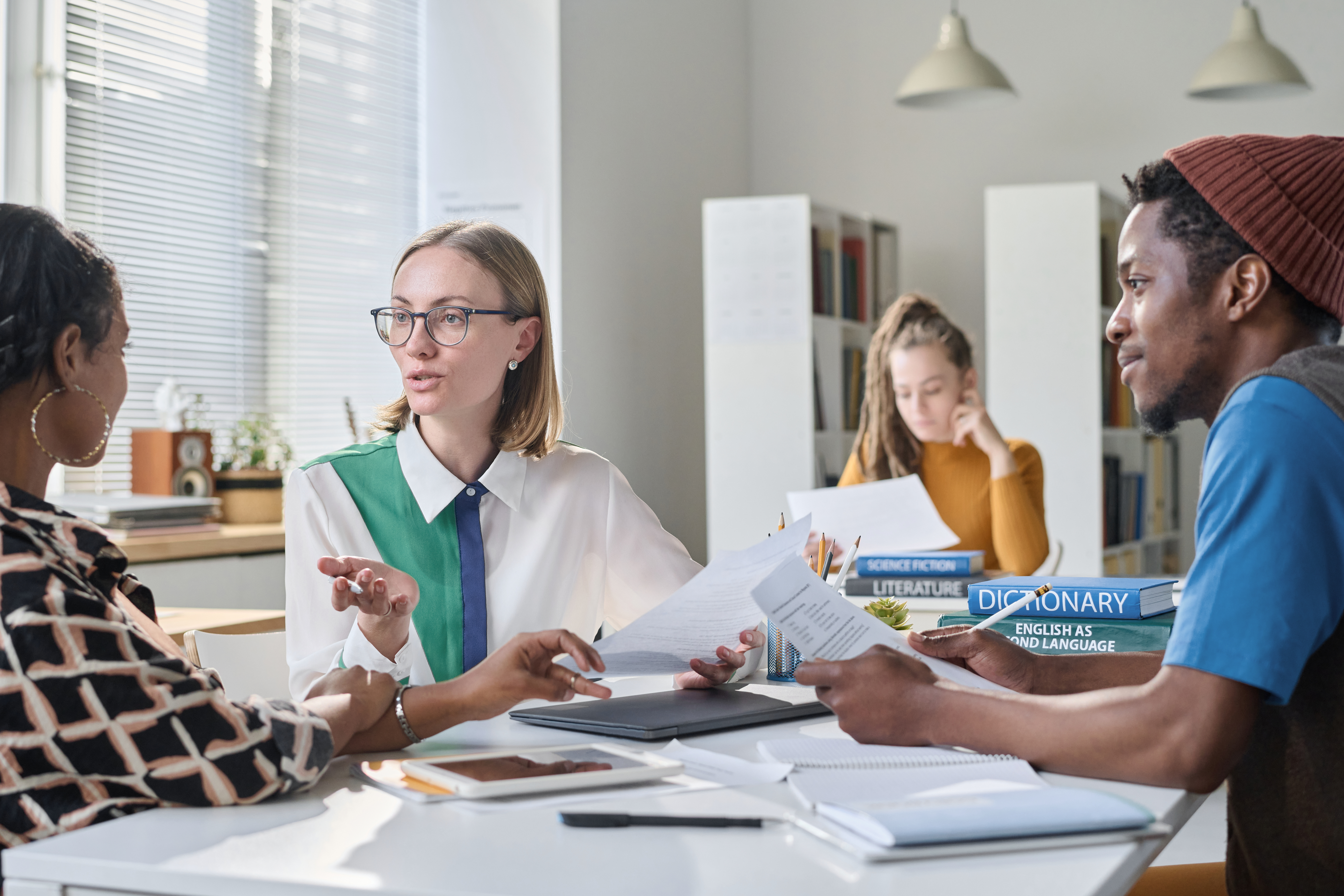 A direct sales recruiter talking to college students