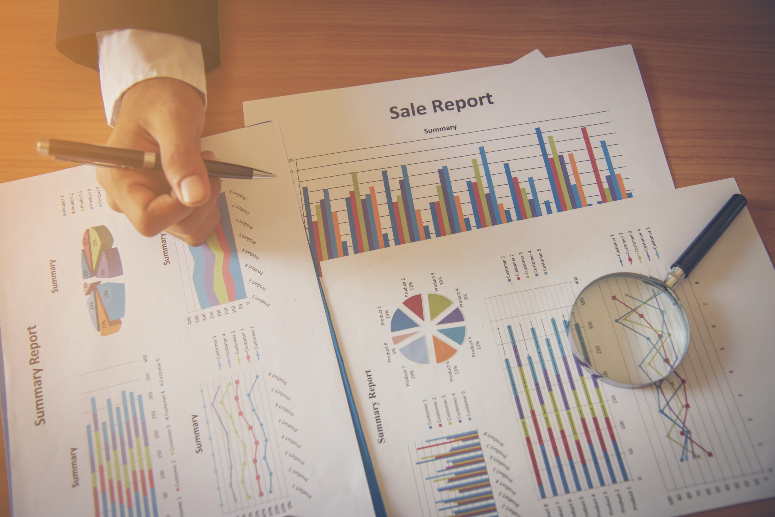 Sales team reviewing historical sales data