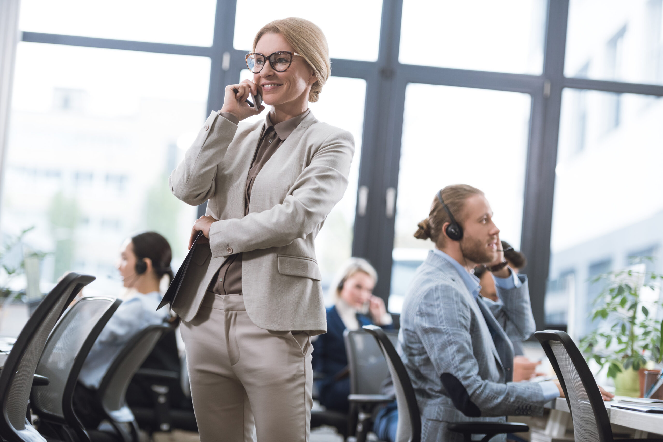 A senior sales representative calling potential clients